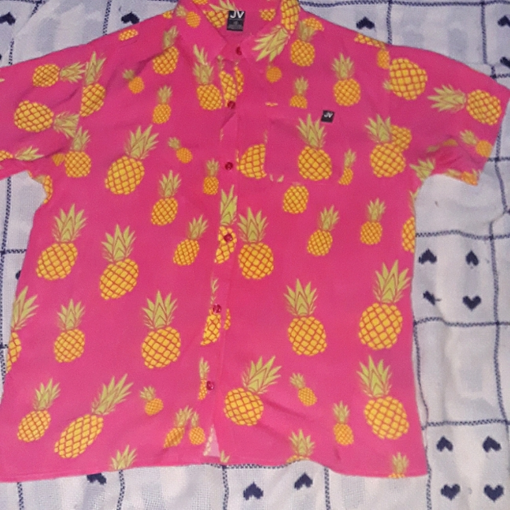 Vibrant pink and yellow pineapple print button up shirt.